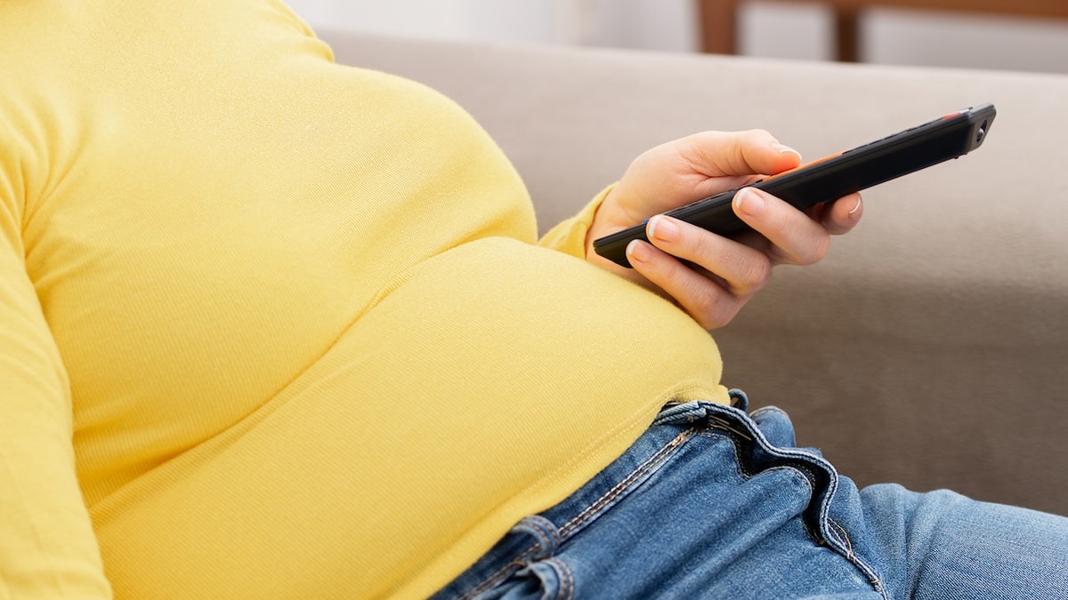 Obesa person sitting